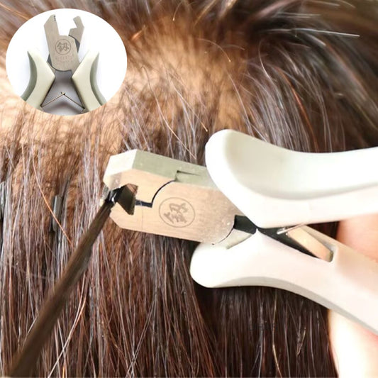 Close-up of notched plier tip opening a 6D C-link.