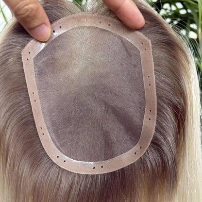 Close-up of threading natural hair through PU perimeter holes on a 4x5 hair topper without clips.