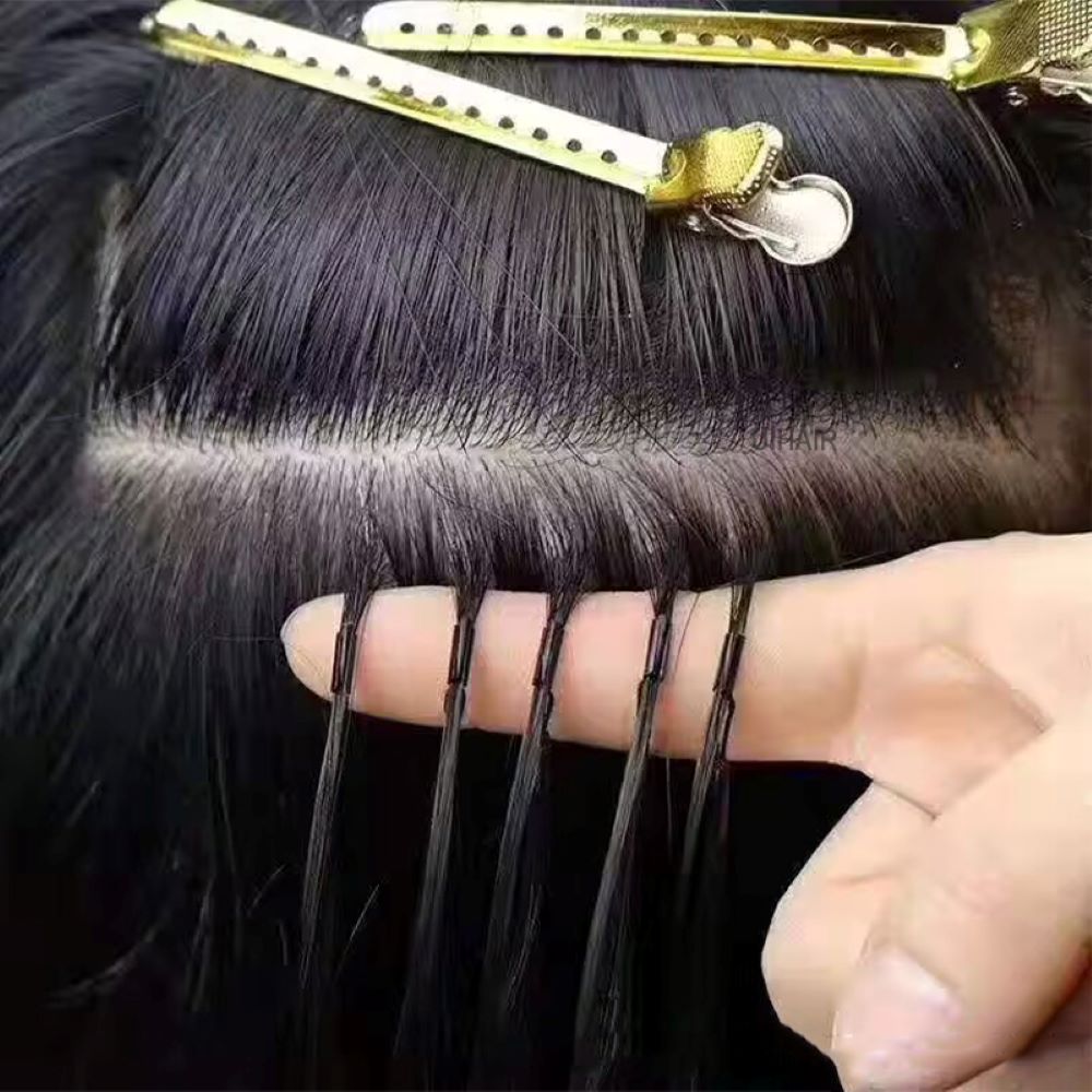 Close up of 5-strand micro link cartridge mechanism on 6D-2 hair extension gun