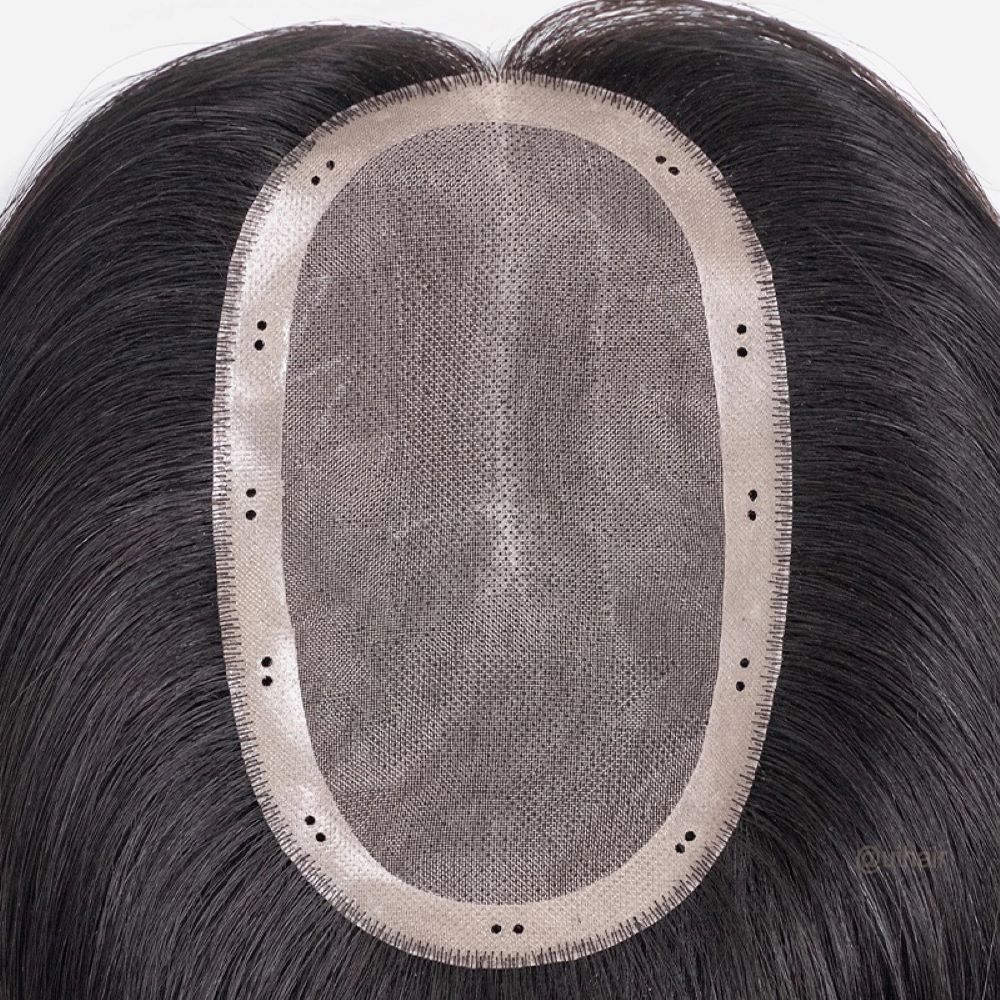 Close-up of the 3x5 Mono base border showcasing the integrated micro-holes for seamless bead-in hair installation.
