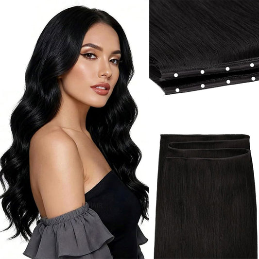 Heat styling premium human hair extensions in natural black with a flat iron up to 180°C for a bone-straight look.