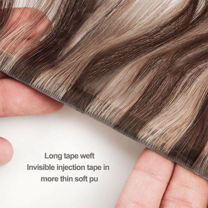 Close up of professional transparent double sided replacement tape being applied onto a reusable skin weft base.