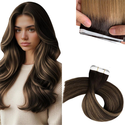 rooted balayage number T4-613 tape in hair weft showing smooth dark root to platinum blonde melt.