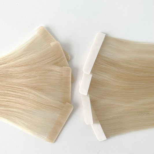 Invisible tape-in bond mimicking natural scalp growth on blonde hair