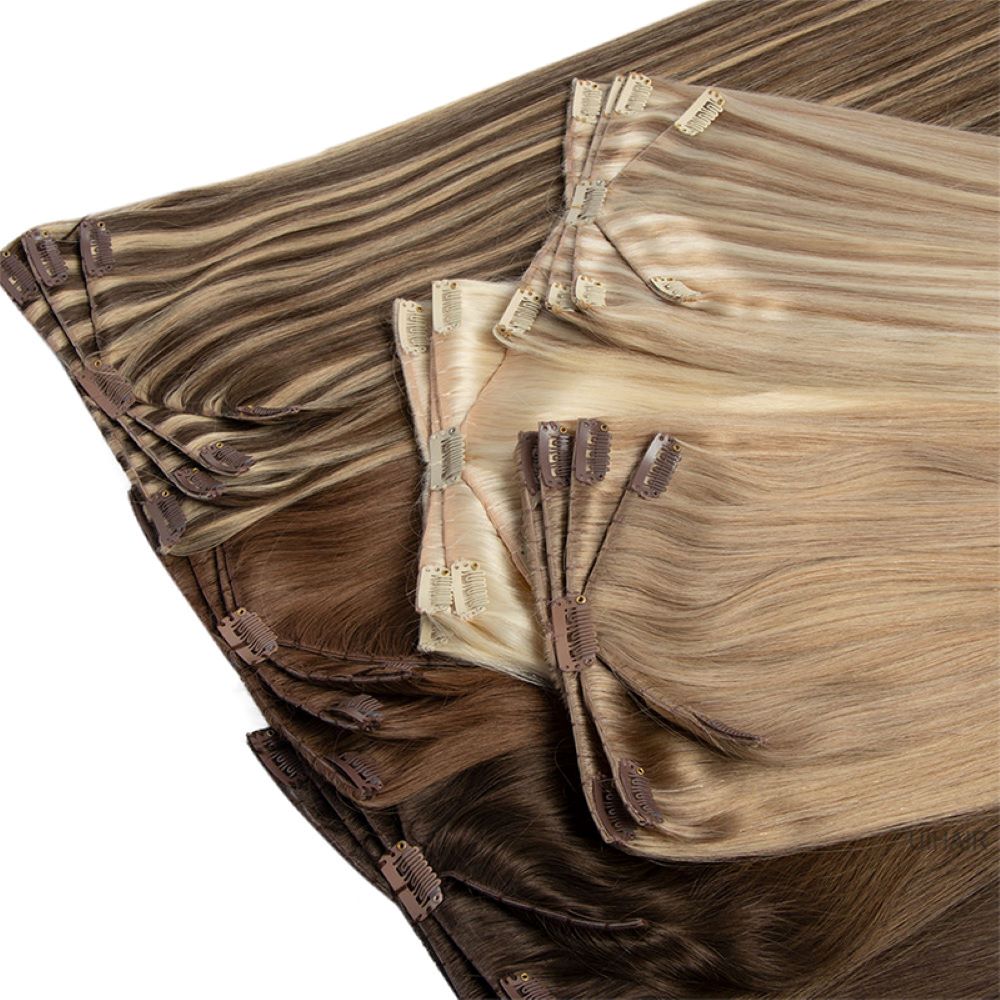 Model-with-cool-toned-blonde-ponytail-using-seamless-extensions