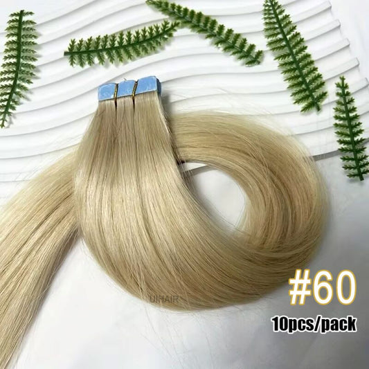 Flat lay of light ash blonde remy hair extensions on white background.